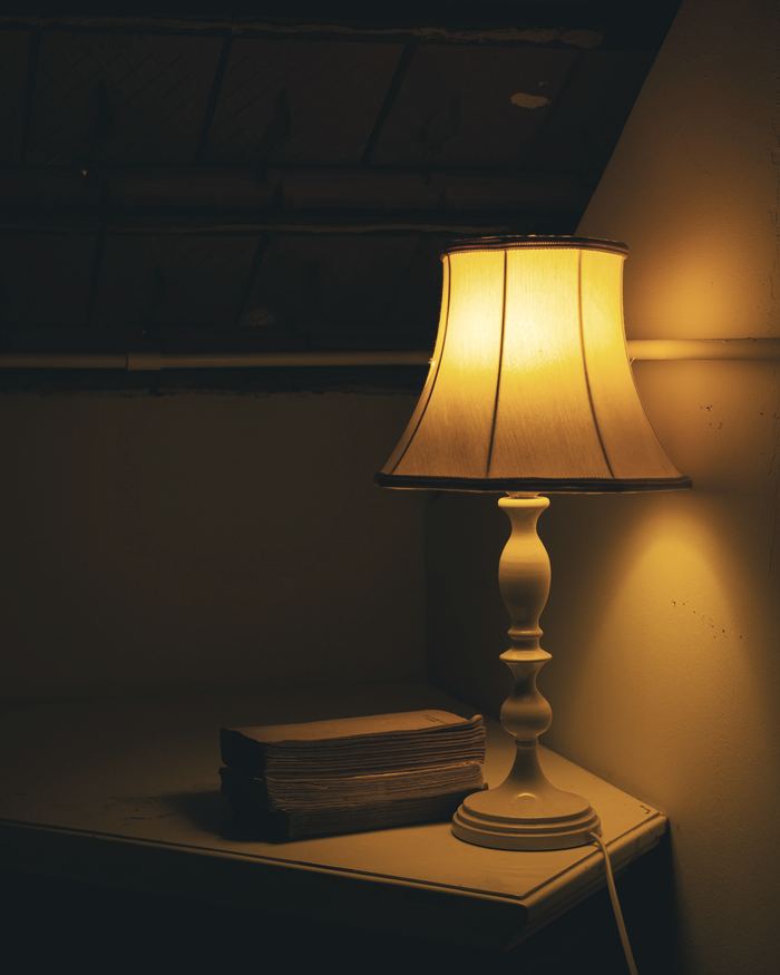 A lamp that is sitting on a table